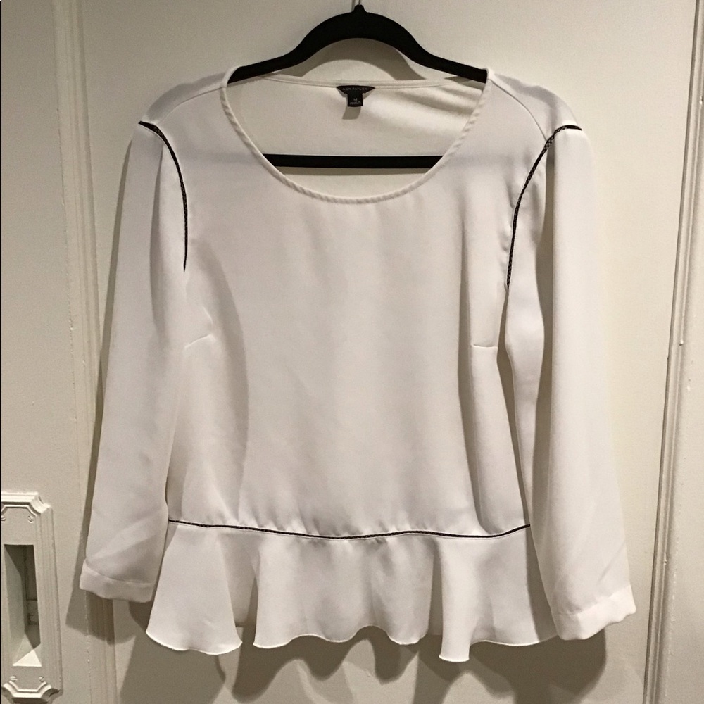 White top with black piping